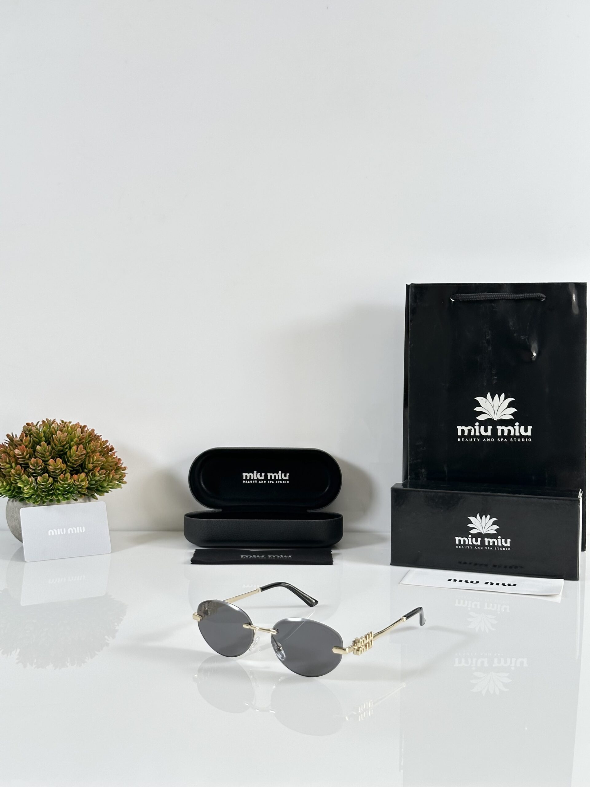 Miu Miu WMNS 1025 Gold Black