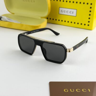 Gucci_gold_black_9125